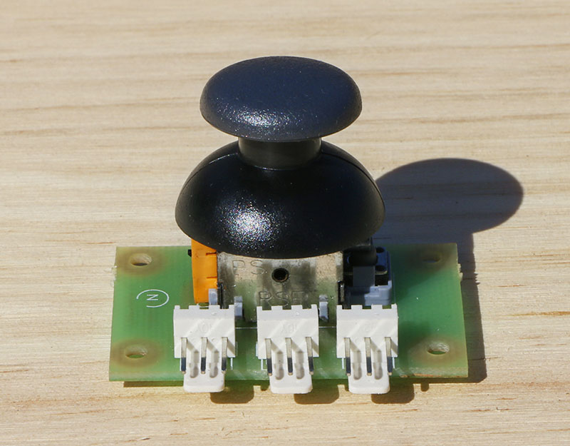 Mini joystick, capteur mécanique de mouvement sur deux axes.